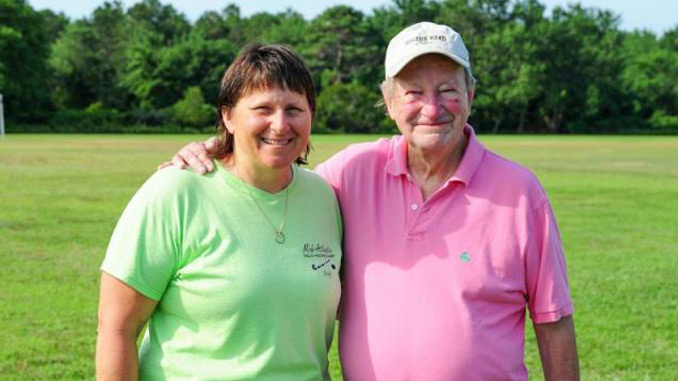 Camp director Frannie Slabonik, left, poses with former director and owner Richard Miller. DAN COOK PHOTO